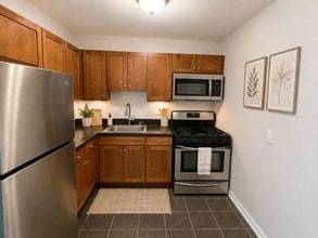 Building Photo - 2026 Move-In Special – $500 LEASE SIGNING BONUS!! Spacious 2BR Condo Near Naylor Rd Metro – Washe...