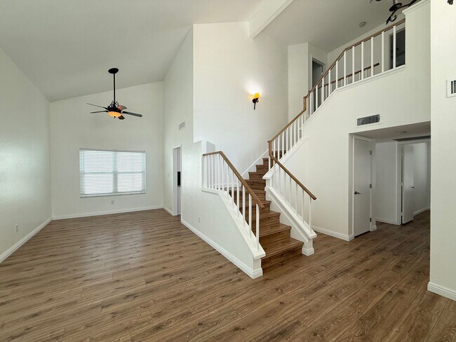 Building Photo - Corner Lot Beauty with Open Living, Guest Suite Down & Expansive Backyard