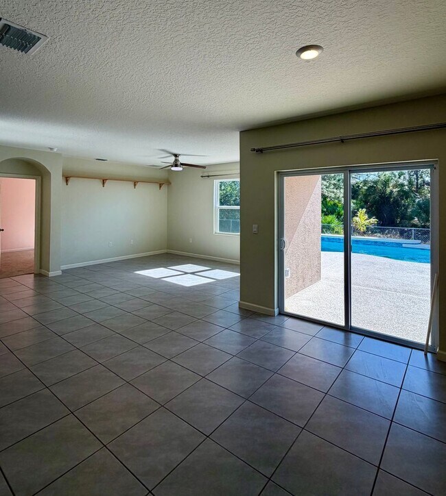 Building Photo - Palm Bay Pool Home Stunner!