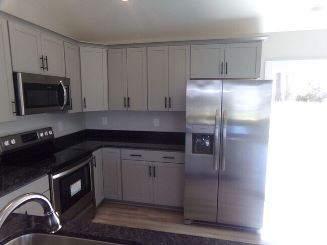 Building Photo - NEW! 3 bedroom home