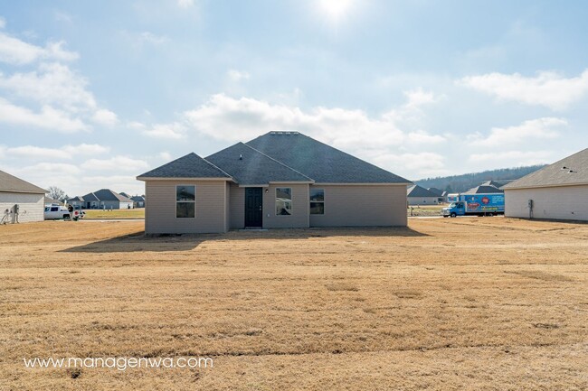 Building Photo - Cozy 4 Bedroom Elkins Home! Lots of upgrad...