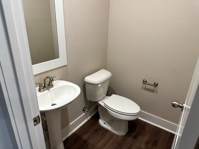 Powder bath off kitchen - 3462 W Tuscan Rd