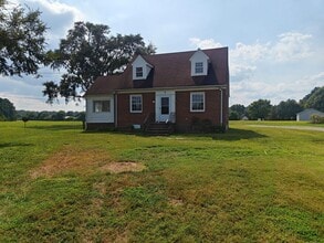 Building Photo - 4 bedroom home with basement