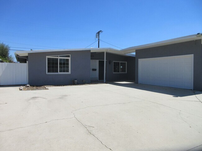 Building Photo - 10818 Paso Robles Ave