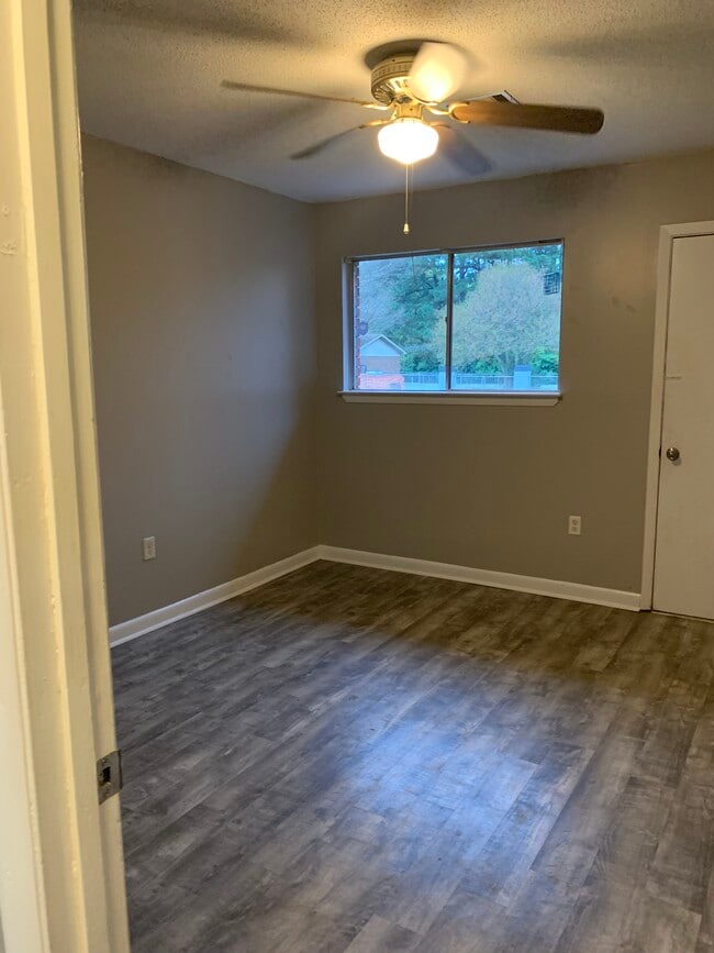 Guest bedroom #3 - has access to garage as well. - 203 Club Ln
