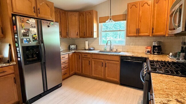 Building Photo - Riverfront Living on the Fox: 2 Bed, 1 Bath with Private Dock and Oversized Garage