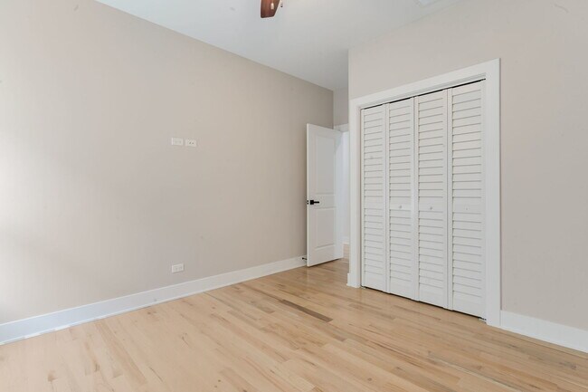 Building Photo - 6410 S Vernon Ave