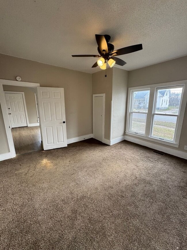 Building Photo - 4 bedroom/1 bath house w/storage building