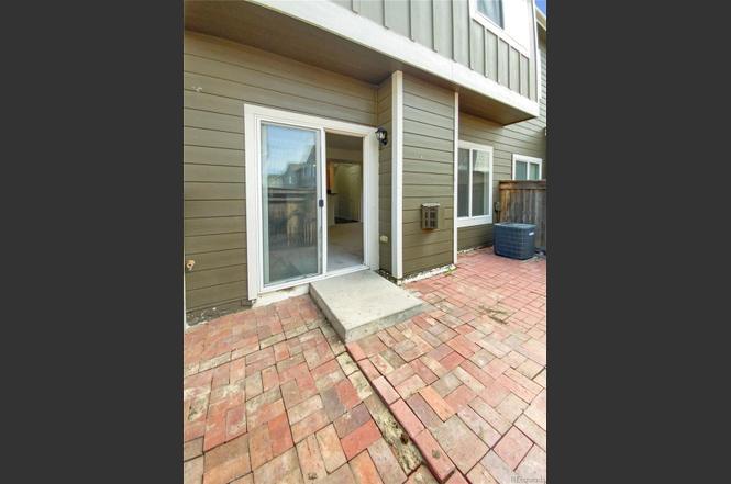 Privately fenced patio - 14700 E 104th Ave