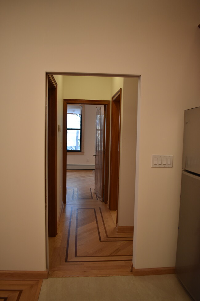 Kitchen to Hall to Master Bedroom - 95 Sherman Ave