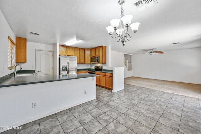 Building Photo - 12925 W Fleetwood Ln