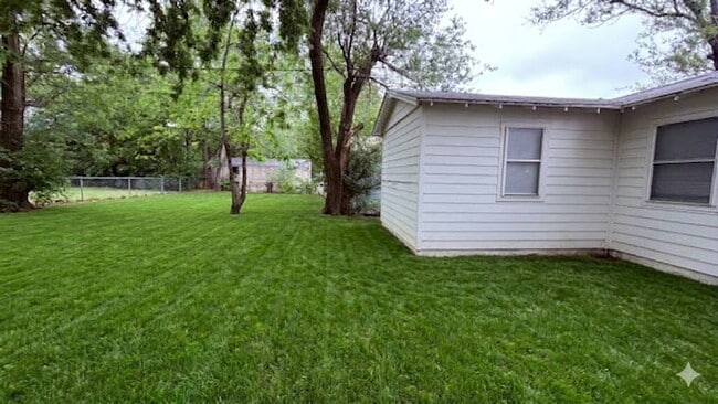 Building Photo - Modern Living Meets Endless Outdoor Potential