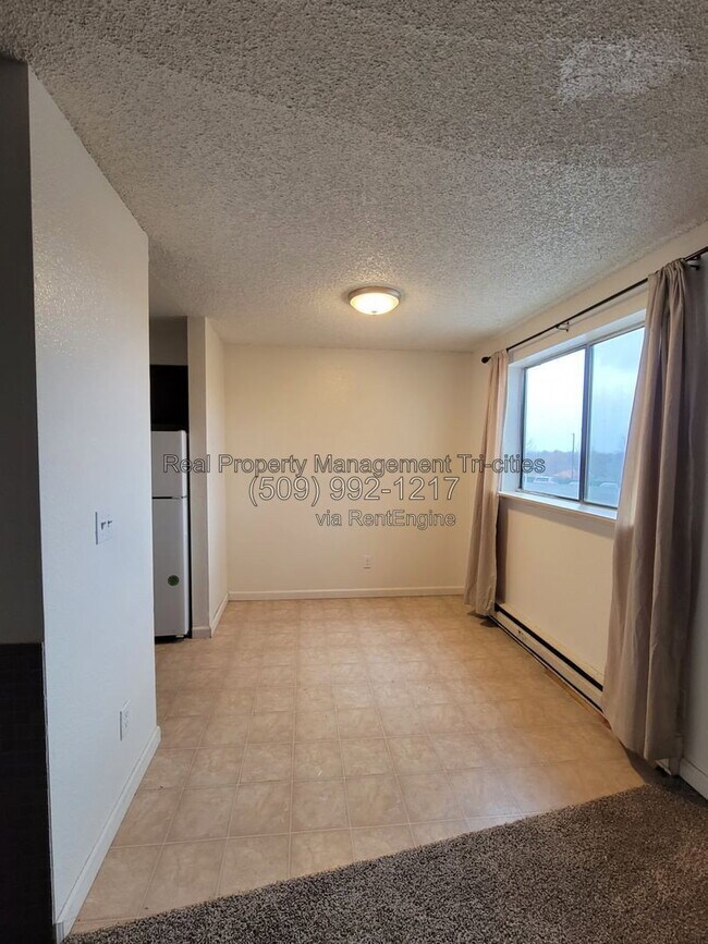 Building Photo - 1102 S Olympia Pl