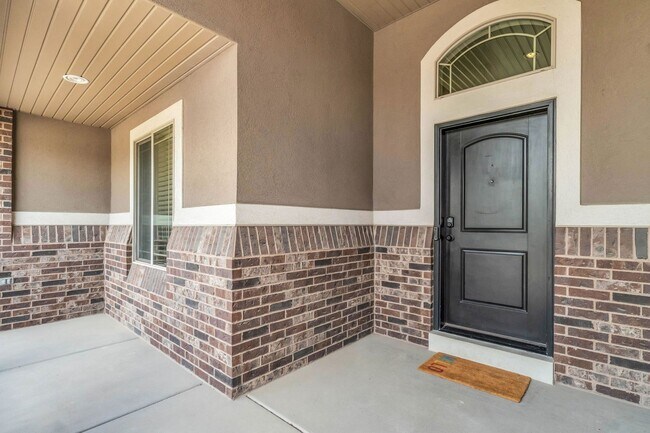 Building Photo - Spacious Syracuse Home with Covered Deck, Loft & Oversized 3-Car Garage