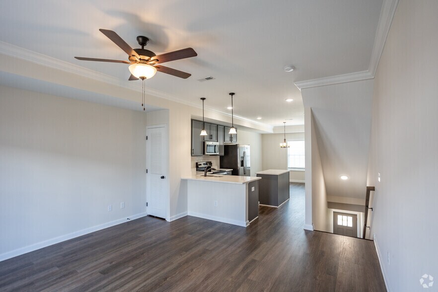 2BR, 2.5BA - 1,500SF - Living Room - The Villas at Charleston Oaks