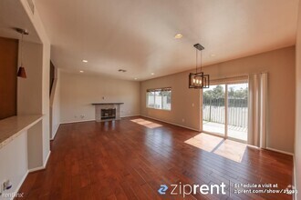 Building Photo - 4 br, 2.5 bath Condo - 20300 Vanowen Stree...