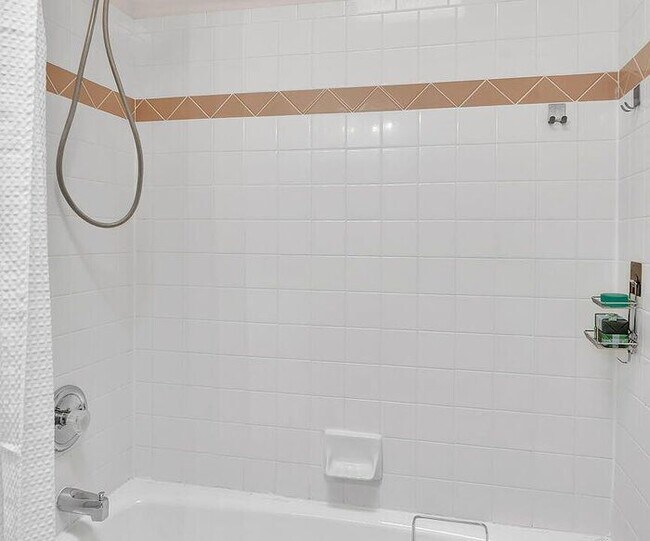 Building Photo - Single-level living at its finest! This co...
