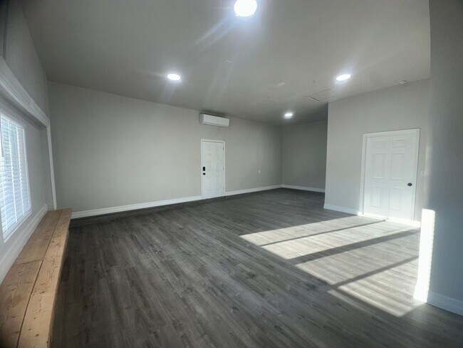 Building Photo - Quiet neighborhood, 3 bedroom, 2 bath home, huge front patio/deck, RV parking!