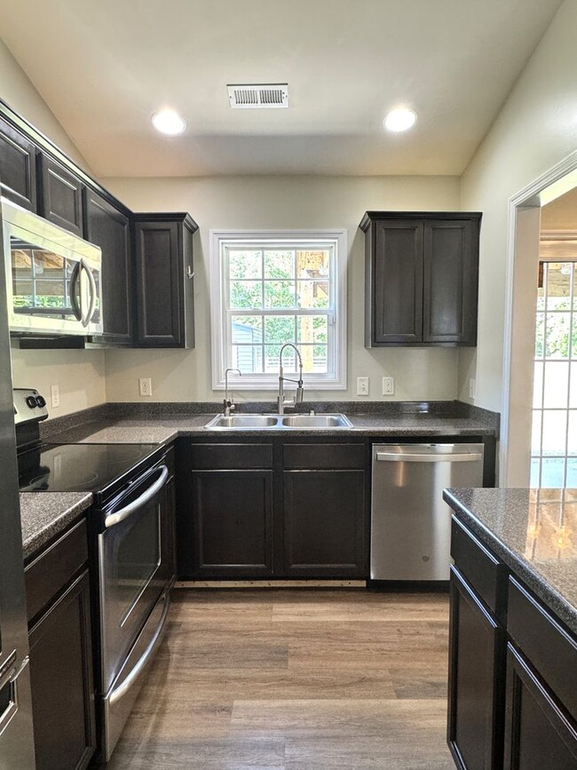 Building Photo - Comfort, Charm & Room for Everything You Love!