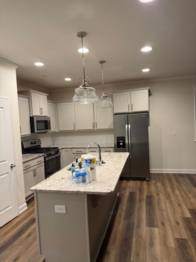 Building Photo - *END UNIT ROLESVILLE TOWNHOME*