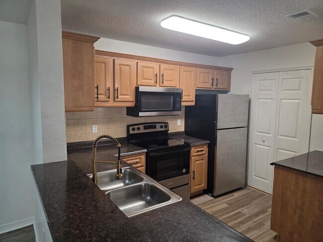 Building Photo - 7606 Pissarro Dr