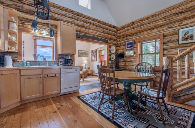Building Photo - Charming Log Cabin and Carriage House – Do...
