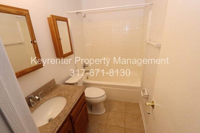 Building Photo - Discover this well-maintained 3-bedroom, 2-bath home in Indianapolis featuring an attached garage...