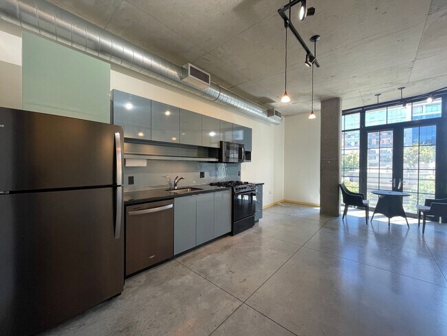 Building Photo - Industrial Highrise Available in the Stree...