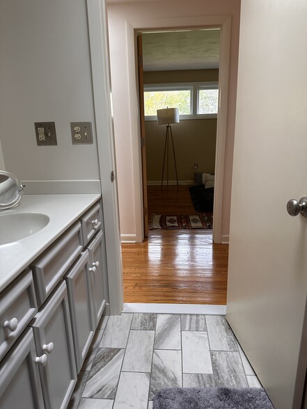 Bathroom view to 3rd bedroom, King bed(unable to provide photo) - 135 Bass Rd