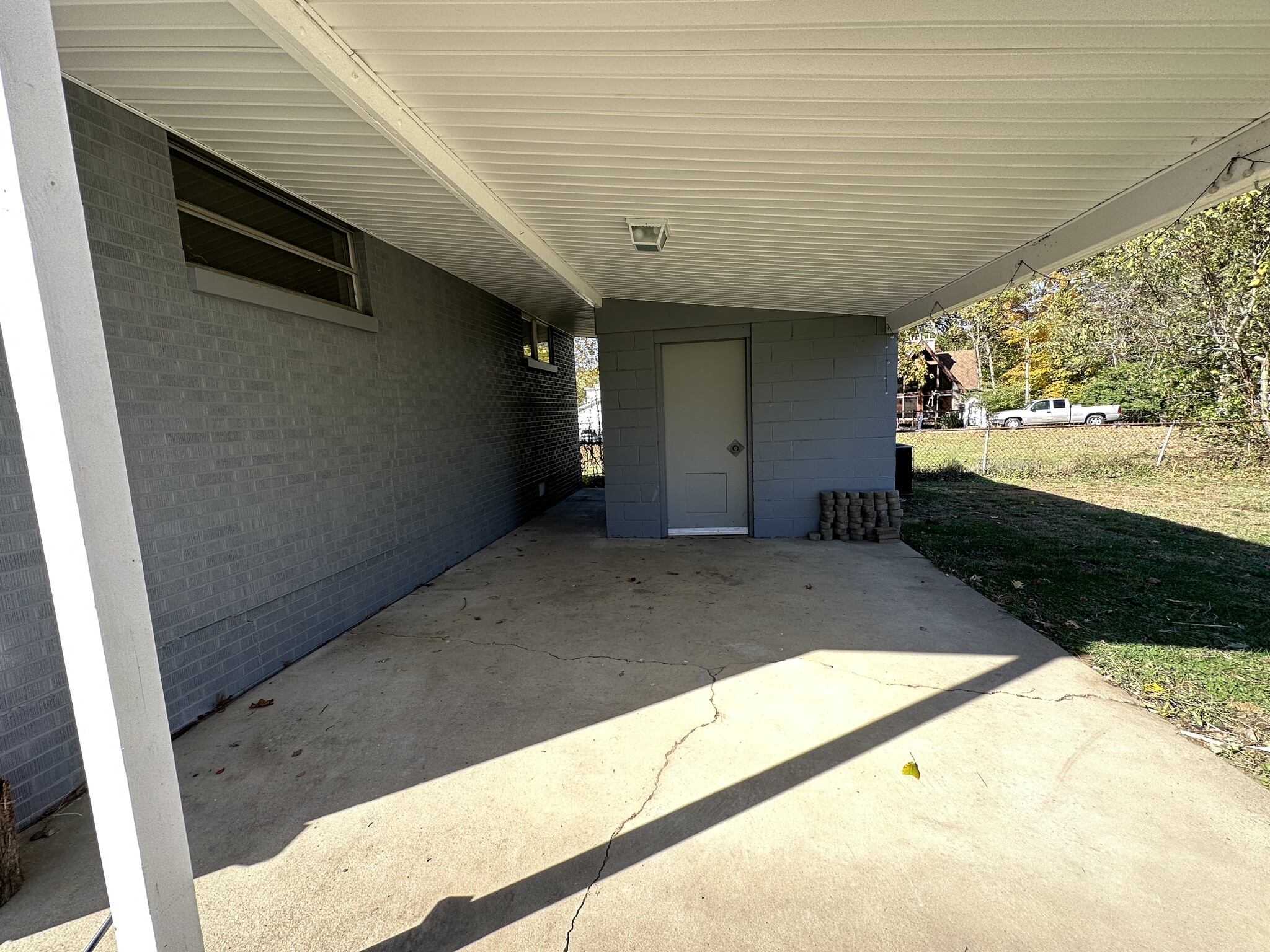 Covered porch & storage building - 6120 Pinedale Dr