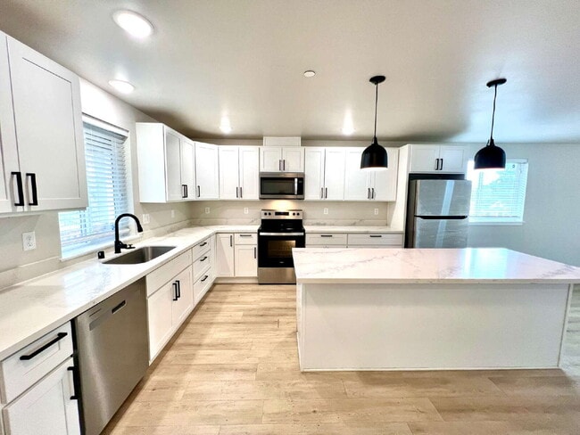 Building Photo - Modern 2022-Built Rambler on Private Lot with 2-Car Garage