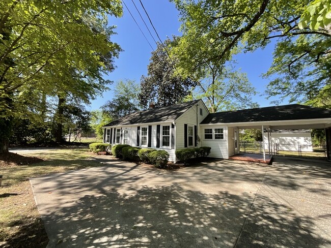 Building Photo - 2br,1ba w/ carport and detached storage bu...