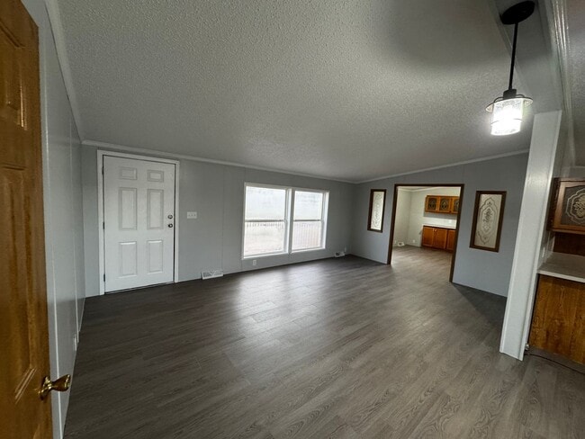 Building Photo - Very large yard great location a nice older doublewide Home