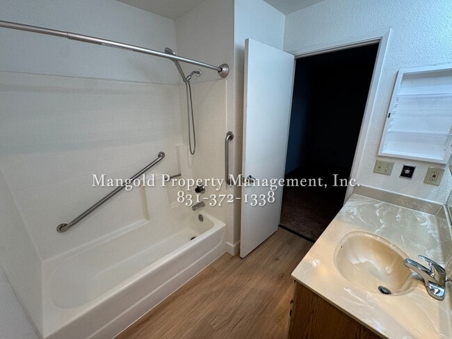 Building Photo - Spacious 2-Bed, 2-Bath Condo with Fireplac...
