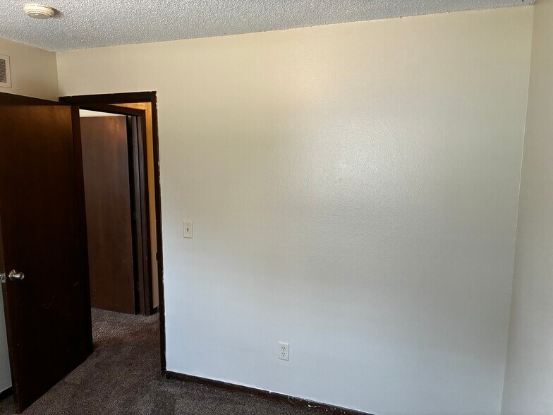 View in the smaller bedroom looking toward the hallway - 1205 Randolph St