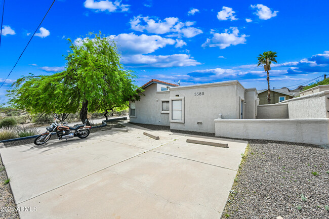 Building Photo - 5580 S Kings Ranch Rd