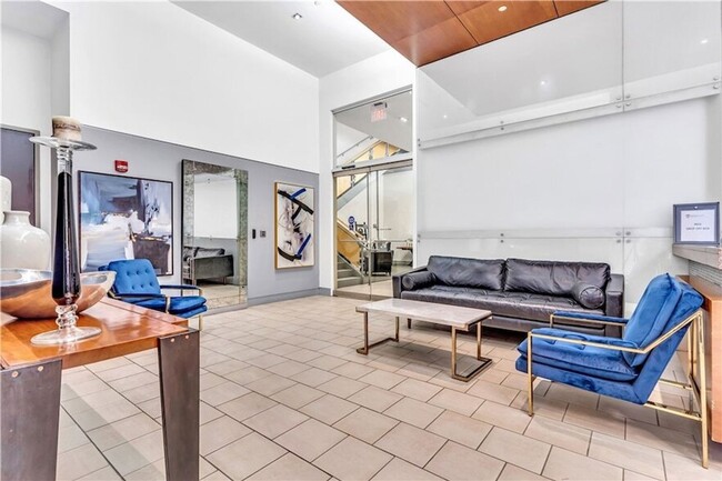 Building Photo - Luxury Penthouse Condo Downtown with Private Patio & Amazing Views Available Now!