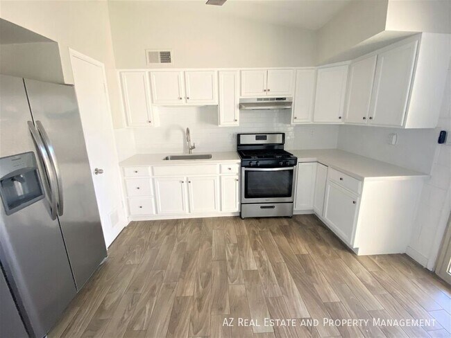 Building Photo - 7035 E Wilshire Dr