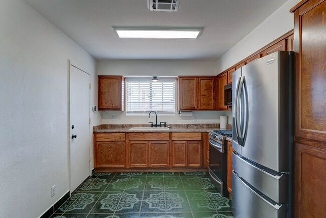 Building Photo - COMING SOON! Spacious 4-Bed Home Near South Mountain with Views and Upgrades