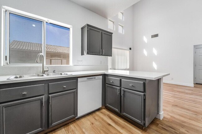 Building Photo - Silverado Ranch: Bright, Open Concept 3/2/2 Home with Downstairs Bedroom & Full Bath, Community Pool
