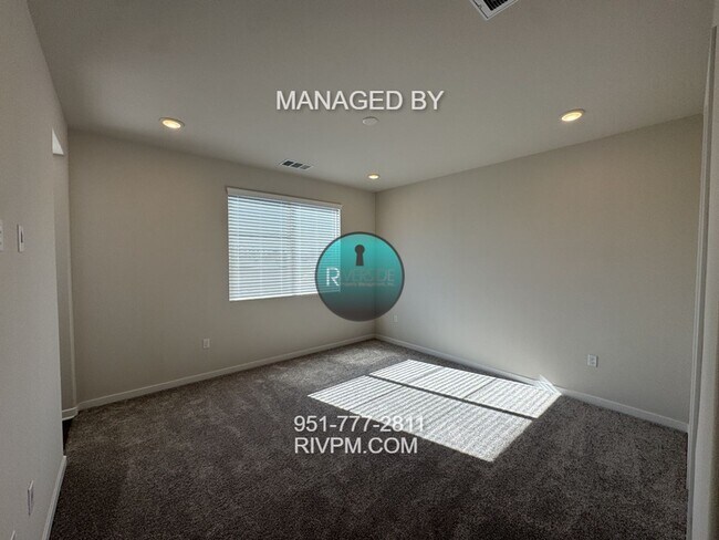 Building Photo - New Build Gem! Modern Three-Bedroom Condo with Bright Open Layout & Private Patio – Available Now!