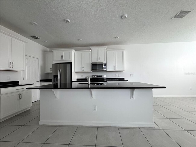 Building Photo - 8973 Matriarca Aly