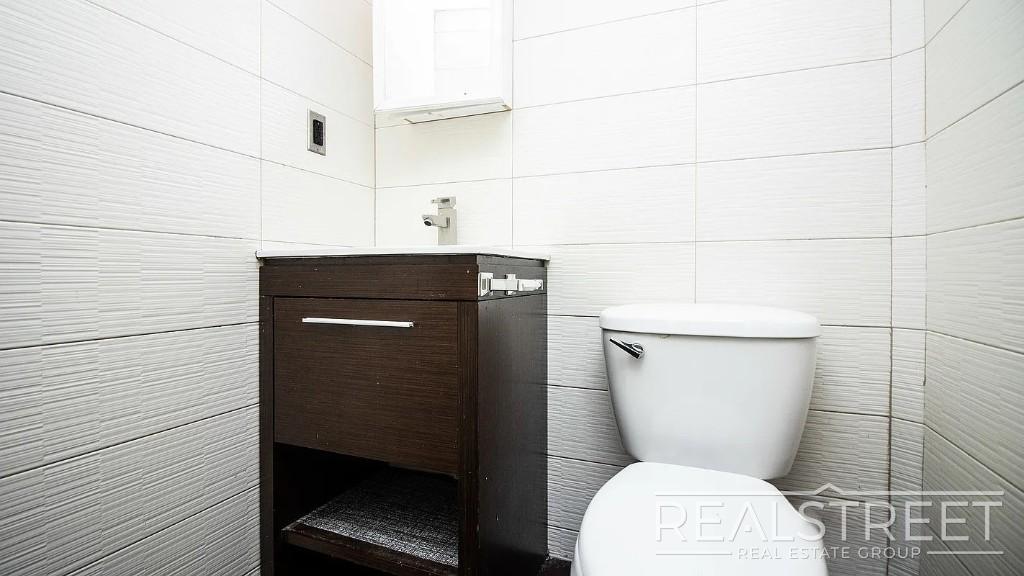 Building Photo - Gut-Renovated 3BR + Massive Finished Basement | Backyard, Laundry & HVAC | Bushwick