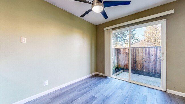 Building Photo - Cozy 1 bedroom 1 bath end unit condo with 1 car garage and private patio located next to Peterson...