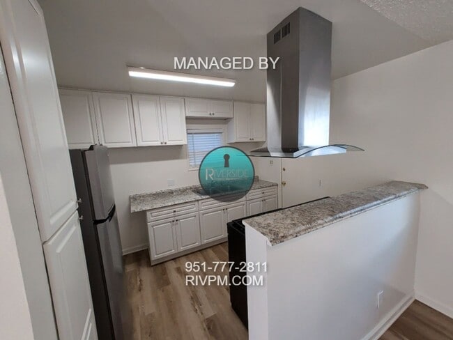 Building Photo - Welcome home to this beautifully refreshed...