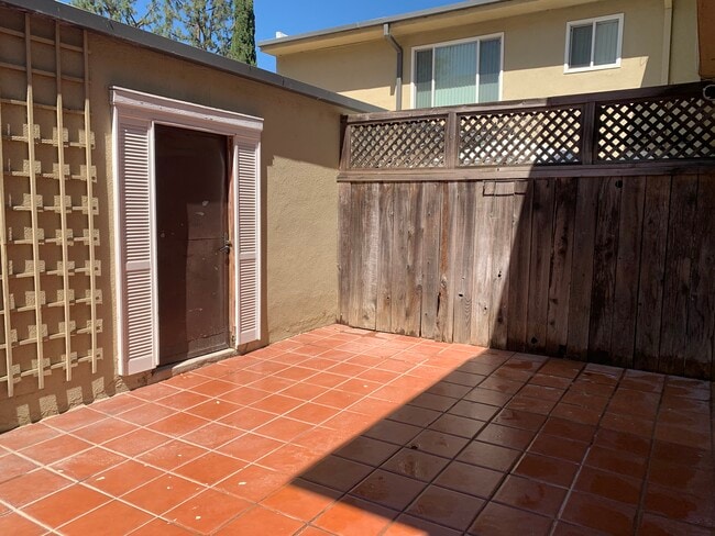 Private patio in back near parking space - 11138 Aqua Vista St
