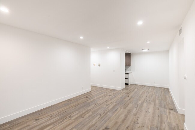 Building Photo - Experience Modern Living: Newly Renovated ...