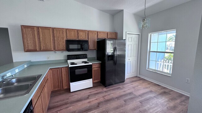 Building Photo - Charming 3/2 House with Updated Flooring with Room to Park a Boat to Trailer in Saint Cloud