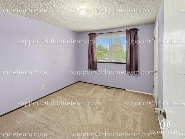 Building Photo - "Spacious 4-Bed Oasis with Granite Touches & Finished Basement in Renton!"