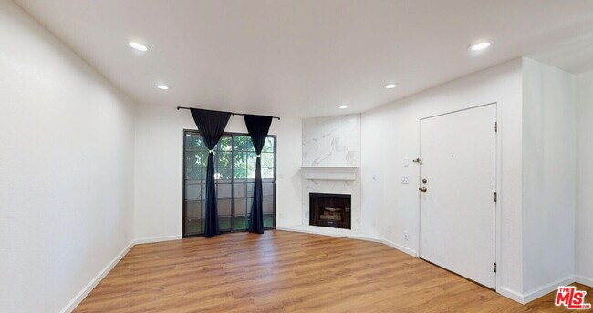 Building Photo - 10220 De Soto Ave